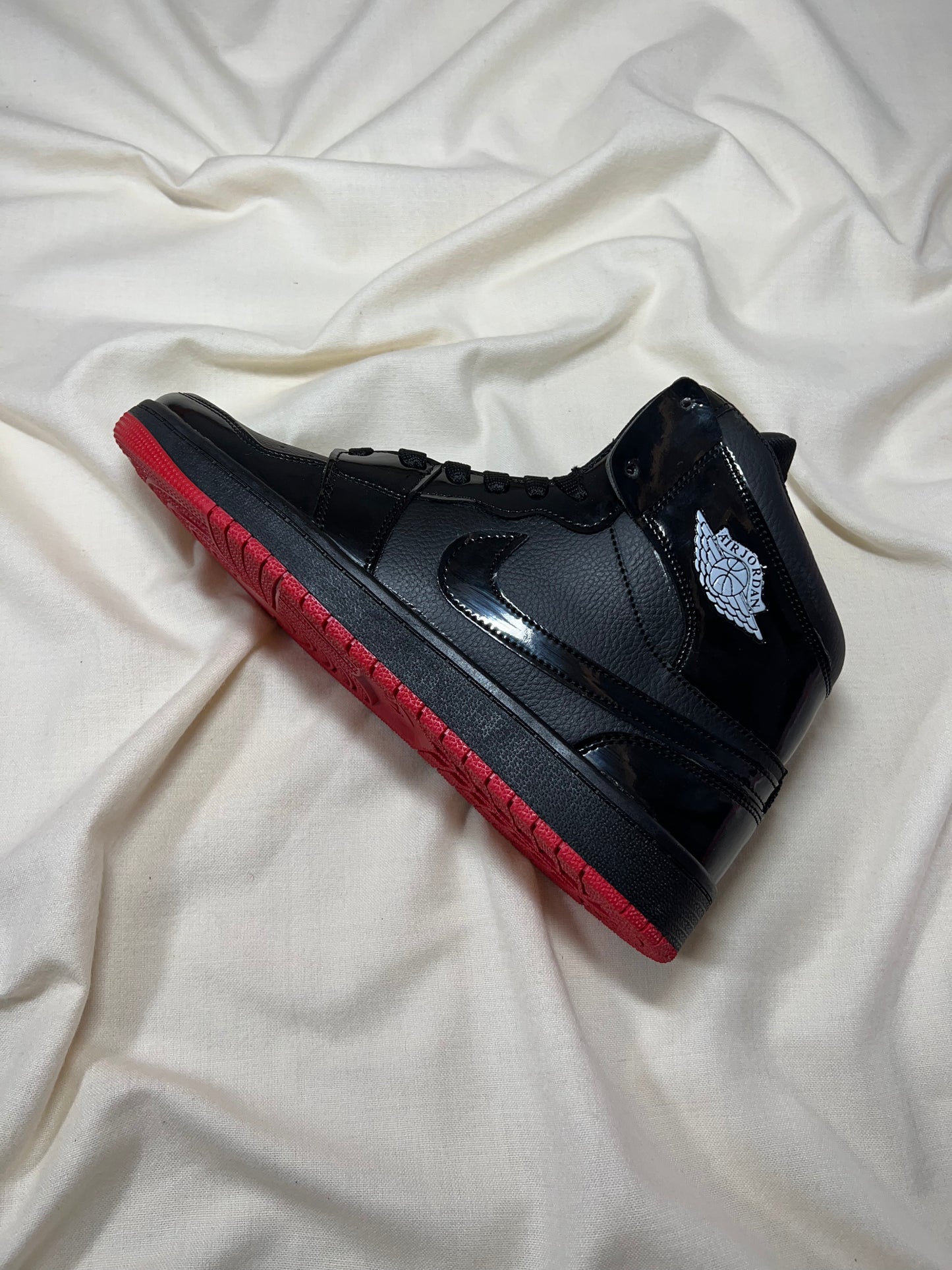 AIR JORDAN 1 PATENT BRED BLACK EDITION